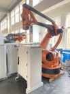 Zastosowany przemysłowy robot palet KUKA KR240 z podstawowymi komponentami PLC i protokołem komunikacji DeviceNet